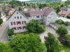 Mehrfamilienhaus mit 11 vermieteten Wohneinheiten in Vögisheim (bei Müllheim) - Brunnenstraße+Müllheim+Haus+Hof2